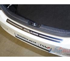 Hyundai Solaris (седан/хетчбэк) 2014- Накладка на задний бампер (лист зеркальный с надписью Solaris) (только хетчбэк) ( шт ) Артикул: HYUNSOL14-10